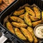Crispy baked avocado fries cooked in an air fryer with parmesan coating and blood pressure-friendly low-carb ingredients